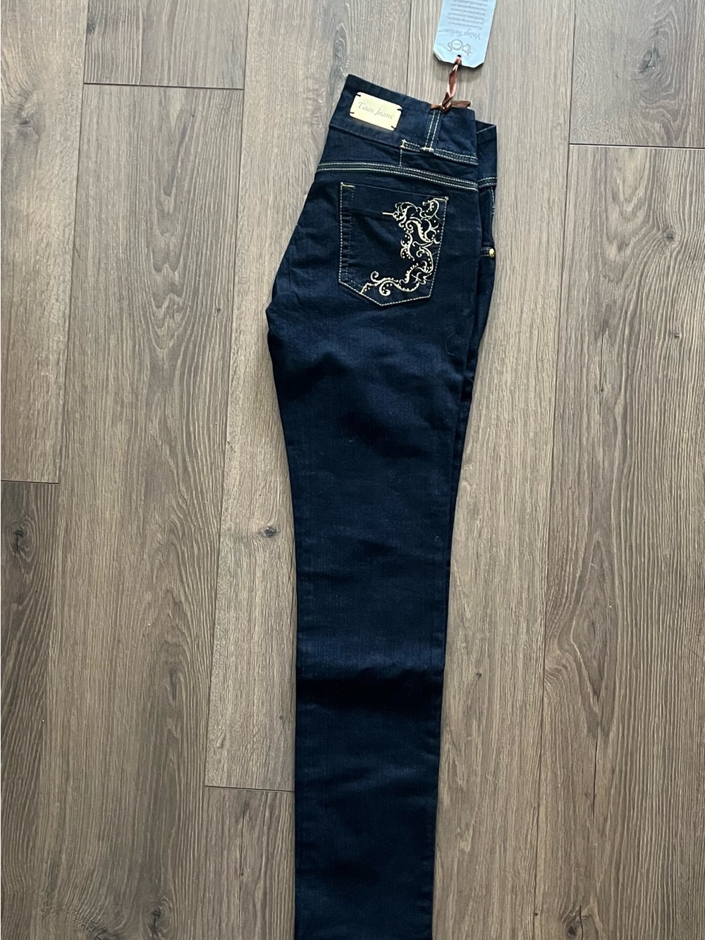 Taos Footwear Dark Indigo Skinny Jeans with Gold Pocket Embroidery
